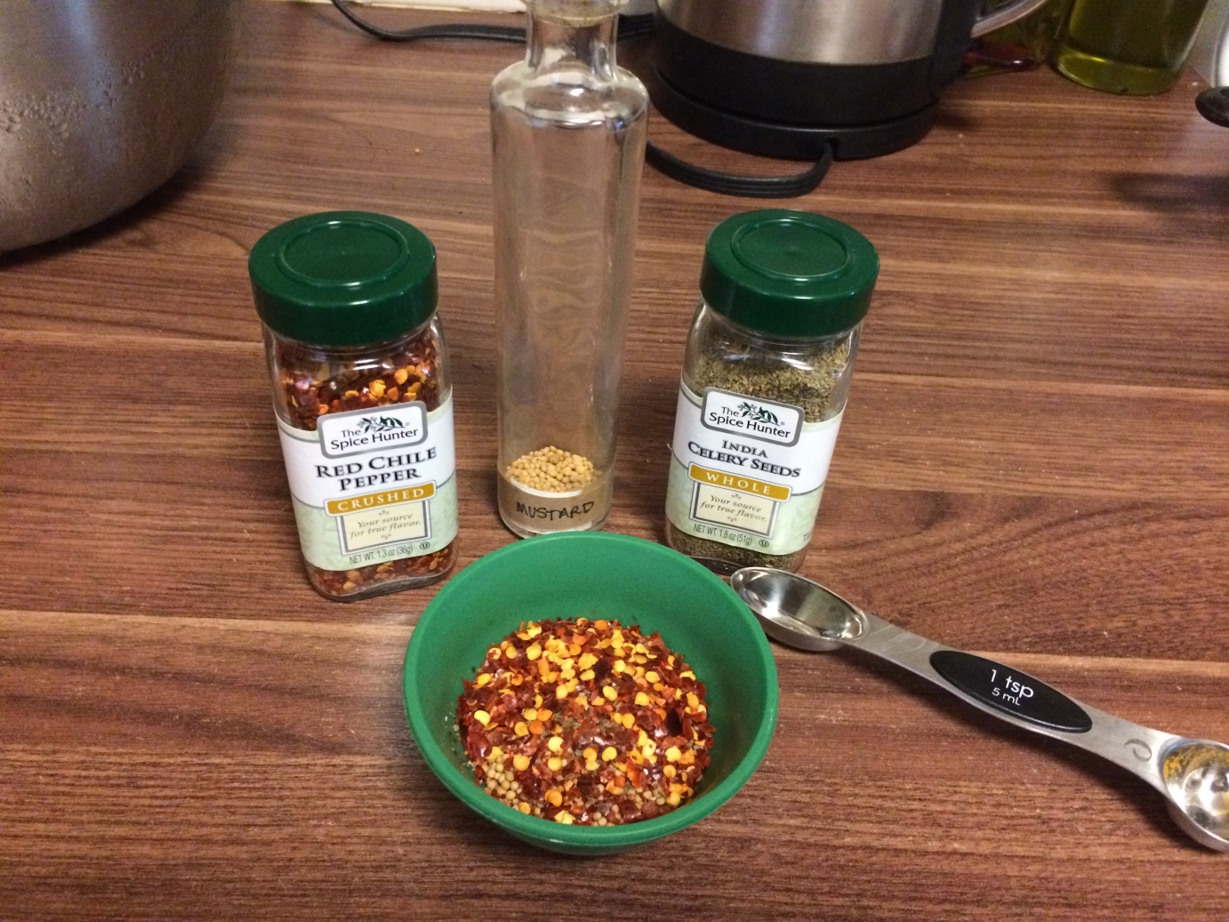 Chile pepper flakes, mustard seed and celery seeds